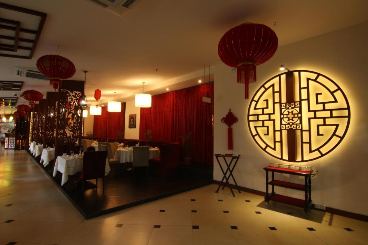 Ramada Plaza By Wyndham Karachi Airport Hotel Exterior foto Interior of a restaurant in Beijing